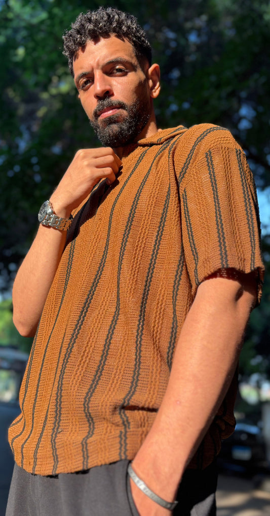 Man wearing classy T-shirt standing in urban street